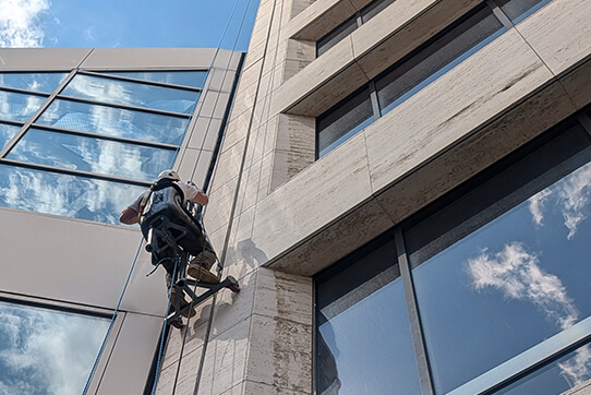 Worker in hoist